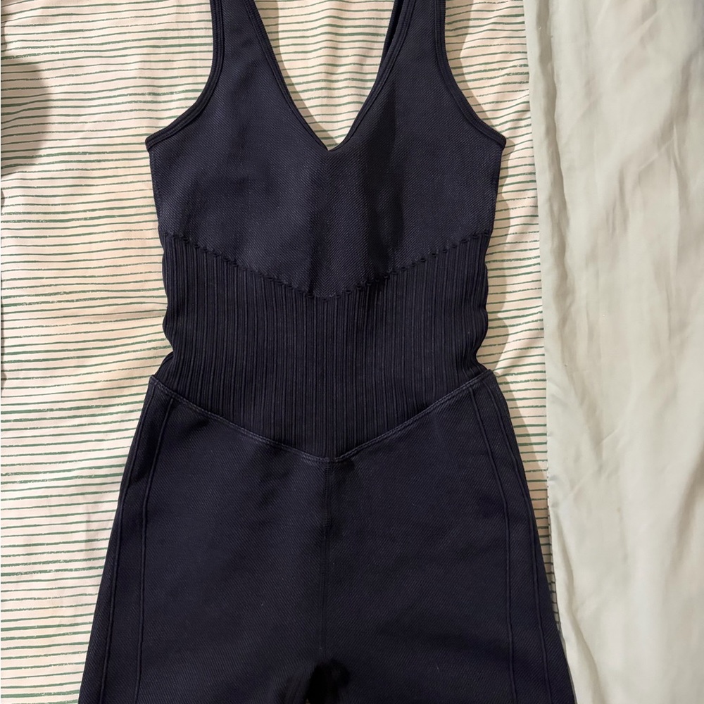 Black joylab one piece (shorts)